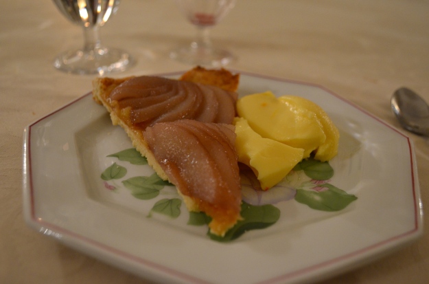 A delicate saffron panna cotta paired perfectly with the poached pair tart